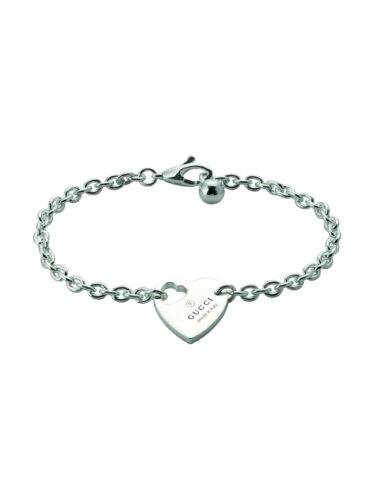 Trademark chain bracelet with charm